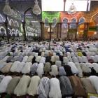 Shi'ite Muslims attend Friday prayers at a shrine in the holy city of Kerbala, Iraq.  Iraq's most...