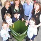 Showing how they are using the hotel's donated worm farm are Queenstown Primary School pupils ...
