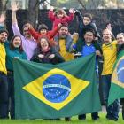 Showing their colours in Dunedin yesterday are Brazilian football fans (from left) Marcelo Castro...