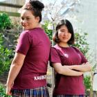 Sia Caldwell (left) and Sherry Sim model the 2013 ''Good One'' T-shirts they designed. Photo by...
