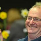 Sidney Gasper Memorial Trophy winner Alan Brown, of Waihola, holds his winning fire eyed daffodil...