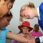 Silver Fern and Southern Steel defender Katrina Grant signs autographs for members of the...