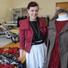 Siobhan Moroney among the fabrics and works in progress in a workroom at the Dunedin Fashion...