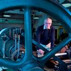 Sir Neil Cossons stands behind an exhaust pump at the Dunedin Gasworks Museum yesterday. Photo by...