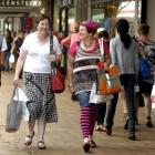 Sisters Robyn Burgess (left), of Owaka, and Mary Keith, of Balclutha, pound the pavement in...