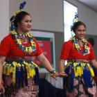 Sisters Taisia Fifita (18, left) and Lusi Fifita (16) dance at the launch of Fale Pasifika O...