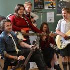 Six60 bassist and synth player Chris Mac with members of Kaikorai Valley College's Instant Crush ...