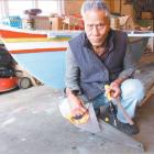 Skilled craftsman: Booro Tione is building a traditional Kiribati canoe by hand in his daughter’s...