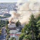 Smoke from the fire billows over Dunedin's southern suburbs. Photos by Stephen Jaquiery and Jane...