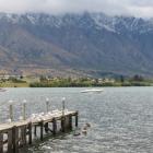 Snow on the Remarkables made for a cool start in Queenstown this morning. Photo James Beech