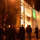 Some of about 100 people start to gather for the blessing of the redeveloped and restored Opera...