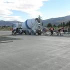 Some of the more than 40 people working on the pouring of Mitre 10 Cromwell's 3000sq m concrete...