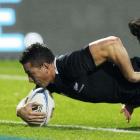 Sonny Bill Williams crashes over for a try against Ireland in Hamilton on Sturday night. REUTERS...