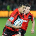 Sonny Bill Williams on attack against the Sharks. Credit:NZPA / Ross Setford.