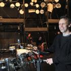 Sound producer Ollivier Ballester prepares a drum kit at Regent Theatre yesterday for the Arts...