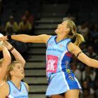 Southern Steel defenders Leana De Bruin (right) and Te Huinga Reo Selby-Rickit try to shut down...
