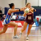Southern Steel's Liana Barrett-Chase, left, and Firebird's Sarah Wall contest the ball. Credit...