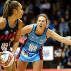 Southern Steel wing defence Stacey Peeters tries to distract Mainland Tactix wing attack Erikana...