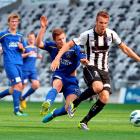 Southern United's Logan Wrightwebb  tries to stop Hawkes Bay striker Aaron Jones during an ASB...