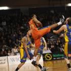 Southland Sharks player Mike Helms climbs high during his side's 82-76 win against the Otago...