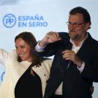 Spain’s Prime Minister and People’s Party  candidate Mariano Rajoy gestures while addressing...