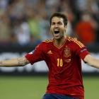 Spain's Cesc Fabregas reacts after scoring the winning penalty goal against Portugal during the...