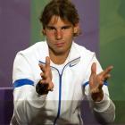 Spain's Rafael Nadal gestures during a press conference at the All England Lawn Tennis...