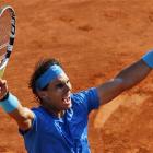 Spain's Rafael Nadal reacts after beating Sweden's Robin Soderling in their French Open...