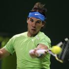 Spain's Rafael Nadal returns the ball to Denis Gremelmayr of Germany during the Qatar Open in...