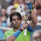 Spain's Rafael Nadal waves to the crowd following his first-round match against Alex Kuznetsov of...