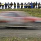 Spectators line the bank to watch Catlins Coast Rally super special stage 8 in Balclutha on...