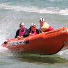 St Clair surf life-savers (from left) Rachel Craythorn (patient), Carla Laughton and Steph...