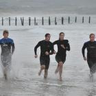St Clair surf lifesavers train at St Clair yesterday (from left)  Angus Mackenzie (17), James...