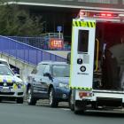 St John ambulance staff treat a 19-year-old skateboarder who crashed into a truck on Broadway....