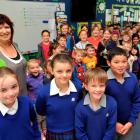 St Joseph's Cathedral School pupils (front, from left) Hermione Dryden, Stella Caulton, Ollie...
