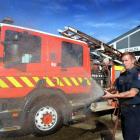 St Kilda firefighter Jason Morey celebrates the opening of the newly renovated St Kilda Fire...