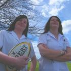 St Peter's College rugby players Melissa Fairbairn (left) and Sarah Williams (both 17) are...