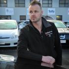 Stadium Cars Dunedin managing director Andrew Graham wants an end to a scam involving his...