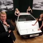 Staff from Bonhams auctioneers pose with the Lotus Esprit from 'The Spy Who Loved Me' in this...