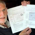 Stamp collector Greg Francis with copies of two items he  sold in a London auction recently....