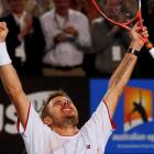 Stanislas Wawrinka celebrates his win over Novak Djokovic. REUTERS/Petar Kujundzic