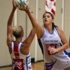 Steel defender Te Huinga Reo Selby-Rickit guards Swifts shooter Erin Bell in a pre-season game at...