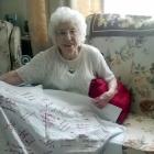Stella Bessell with the quilt which had been in her family's possession for nearly 100 years....