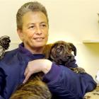 Otago SPCA senior inspector Stephanie Saunders at home with some of the residents at the Dunedin...