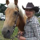 Stephanie White and Ricky are enjoying competing in the second division barrel race on the...