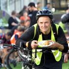 Steve Walker, of Port Chalmers, enjoys a free breakfast in the Octagon yesterday. PHOTO: PETER...