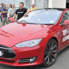 Steve West shows off his top-of-the-line Tesla Model S electric car in Dunedin yesterday. Photo...