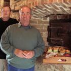Stonemasons Stuart Mason, of Invercargill (left), and Keith Hinds, of St Bathans, inspect their...