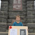 Strath Taieri School pupil William Tisdall holds a picture of fallen Gallipoli soldier Arthur...