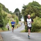 Stu McCormack leads a group of runners up the hill near Burkes during the 2016 Port Chalmers Road...